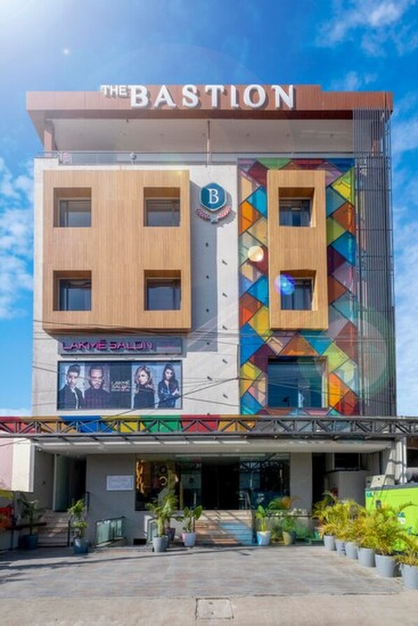 A building with a sign reading "The Bastion" and a salon named "Lakme Salon" on the ground floor. - Hotel Bastion (Bhopal)