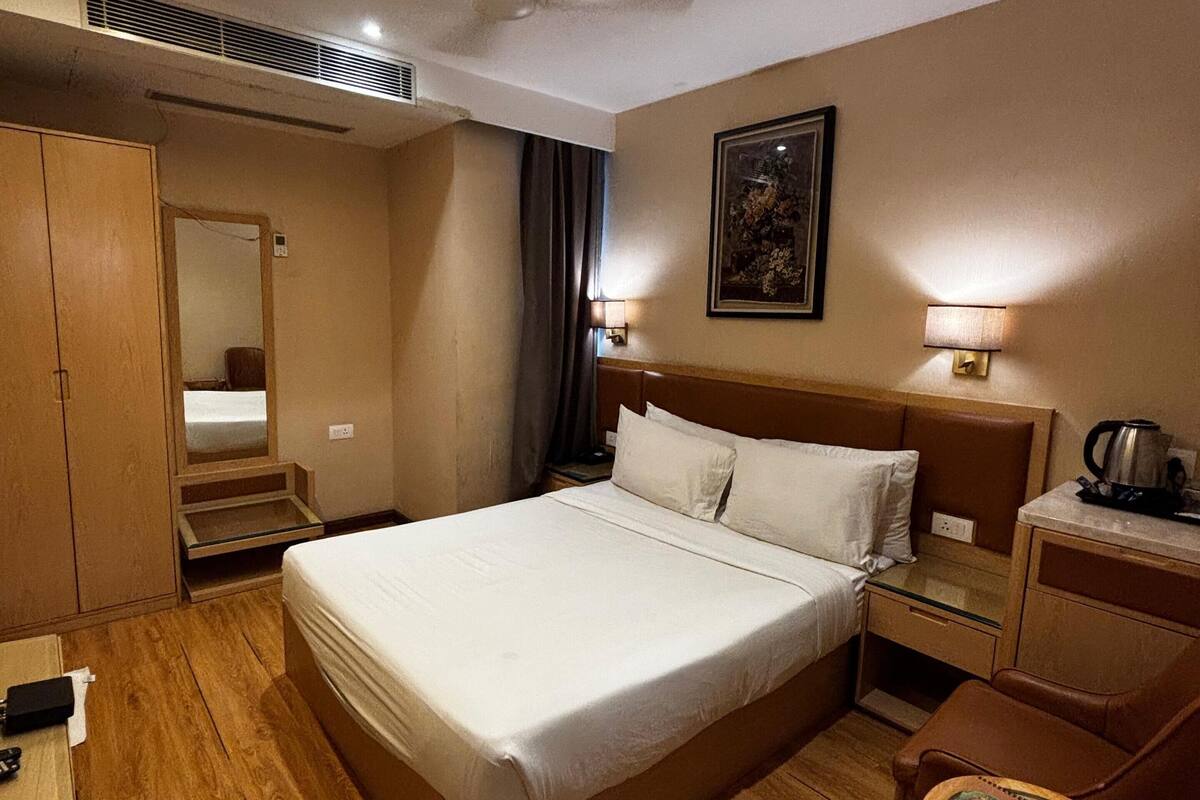 Quarto luxo | Edredons de pluma, Wi-Fi de cortesia, roupa de cama