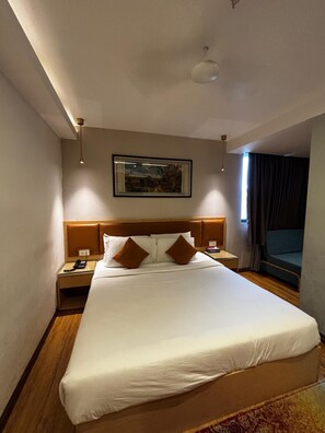 Quarto premium | Edredons de pluma, Wi-Fi de cortesia, roupa de cama