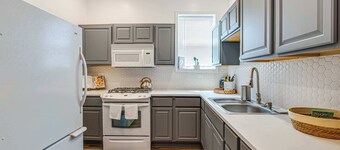 Cozy 4BR Home with Crib & Games, Nearby Sights