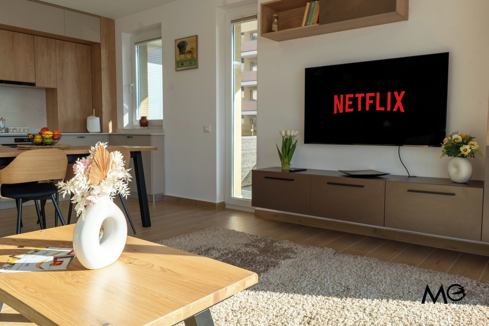 Deluxe Apartment, 1 Bedroom, Balcony, Mountain View | Living area | 125-cm Smart TV with cable channels, Netflix, streaming services