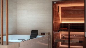 A modern bathroom with a large bathtub, wooden paneling, and a glass shower enclosure. - Pool & SPA Vatican Luxury Apt (Roma)