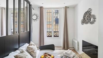 1 bedroom, desk, iron/ironing board, travel cot
