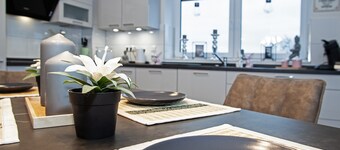 Above the Rooftops of Grasberg's City