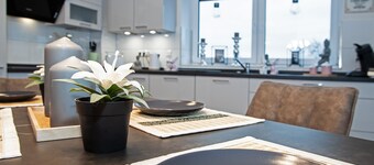 Above the Rooftops of Grasberg's City