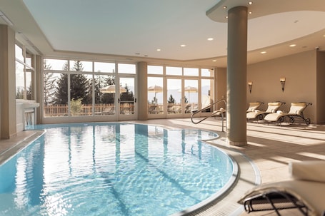 Indoor pool, outdoor pool, open 7:00 AM to 7:00 PM, pool umbrellas