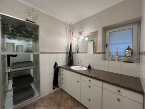 Hair dryer, towels, soap, toilet paper