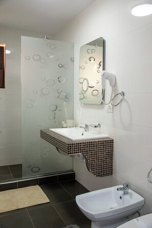 Apartment, Balcony, Mountain View | Bathroom | Shower, hair dryer, towels, soap
