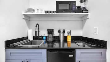 Fridge, microwave, stovetop, coffee/tea maker