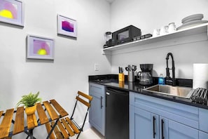 Fridge, microwave, stovetop, coffee/tea maker