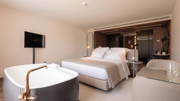 Literie hypoallergénique, minibar, coffres-forts dans les chambres