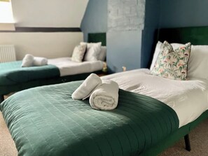 4 bedrooms, iron/ironing board, travel cot, WiFi