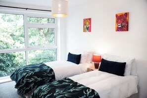 2 chambres, fer et planche à repasser, Wi-Fi, draps fournis