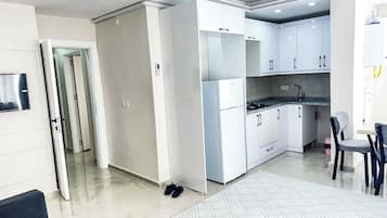 Appartamento Deluxe, 1 letto king con divano letto, balcone | Area soggiorno