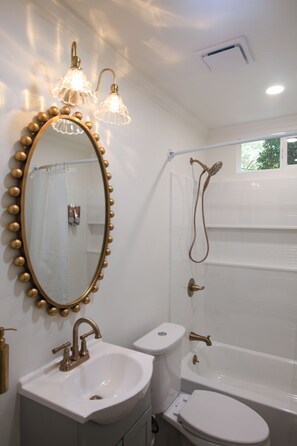 Hair dryer, towels, soap, shampoo