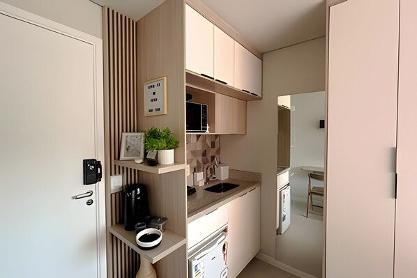 Microwave, coffee/tea maker, cookware/dishes/utensils