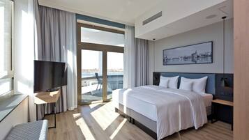 Apartment, 1 Bedroom, Terrace, Lake View | Hypo-allergenic bedding, down duvets, minibar, in-room safe