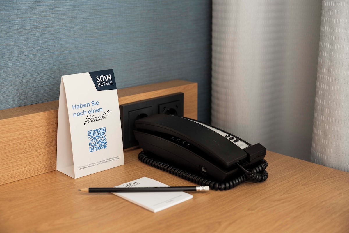 Hypo-allergenic bedding, down comforters, minibar, in-room safe