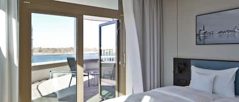 Appartement Confort | Literie hypoallergénique, couette en duvet, minibar