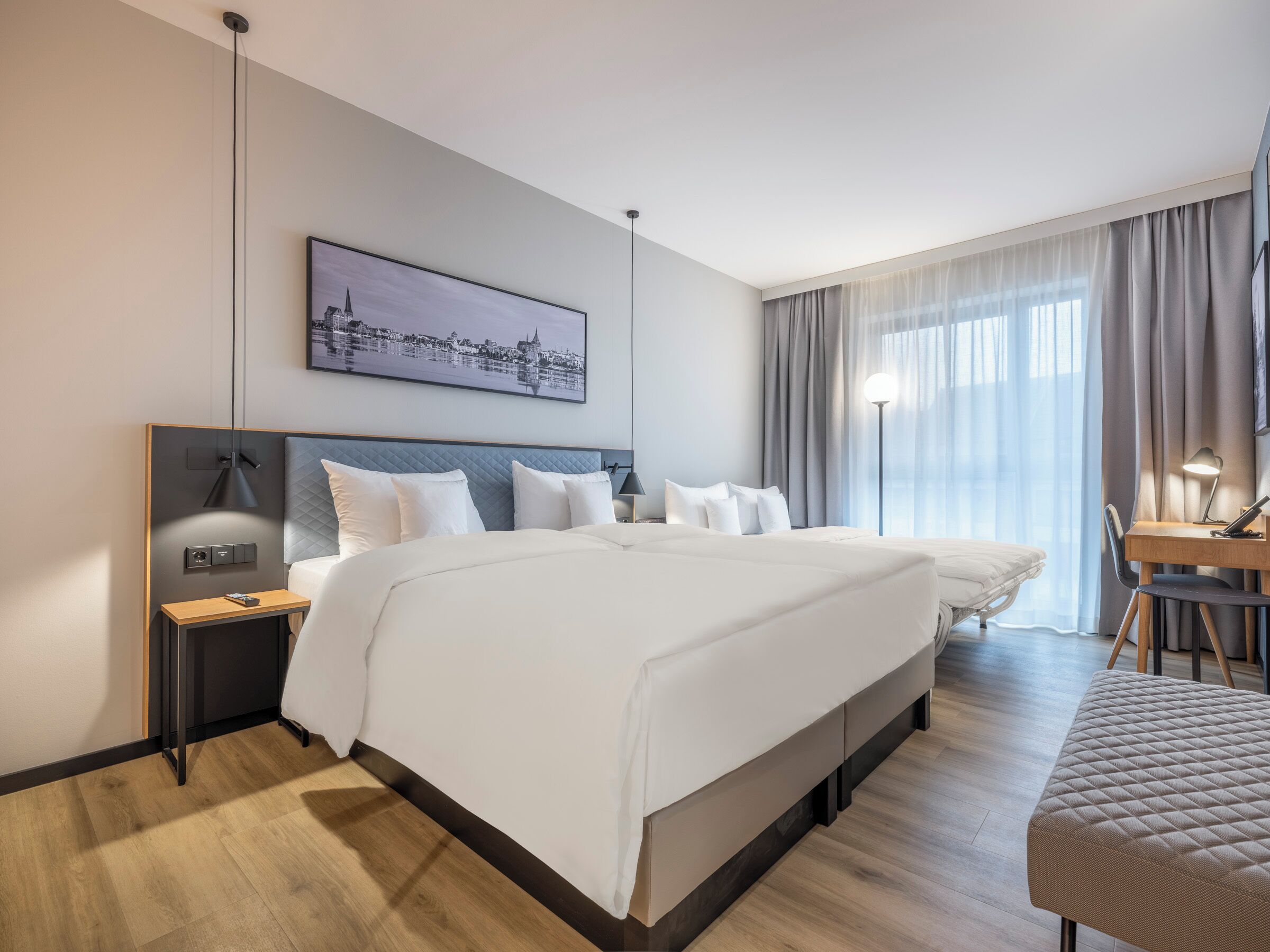 Family Triple Room, City View | Hypo-allergenic bedding, down duvets, minibar, in-room safe