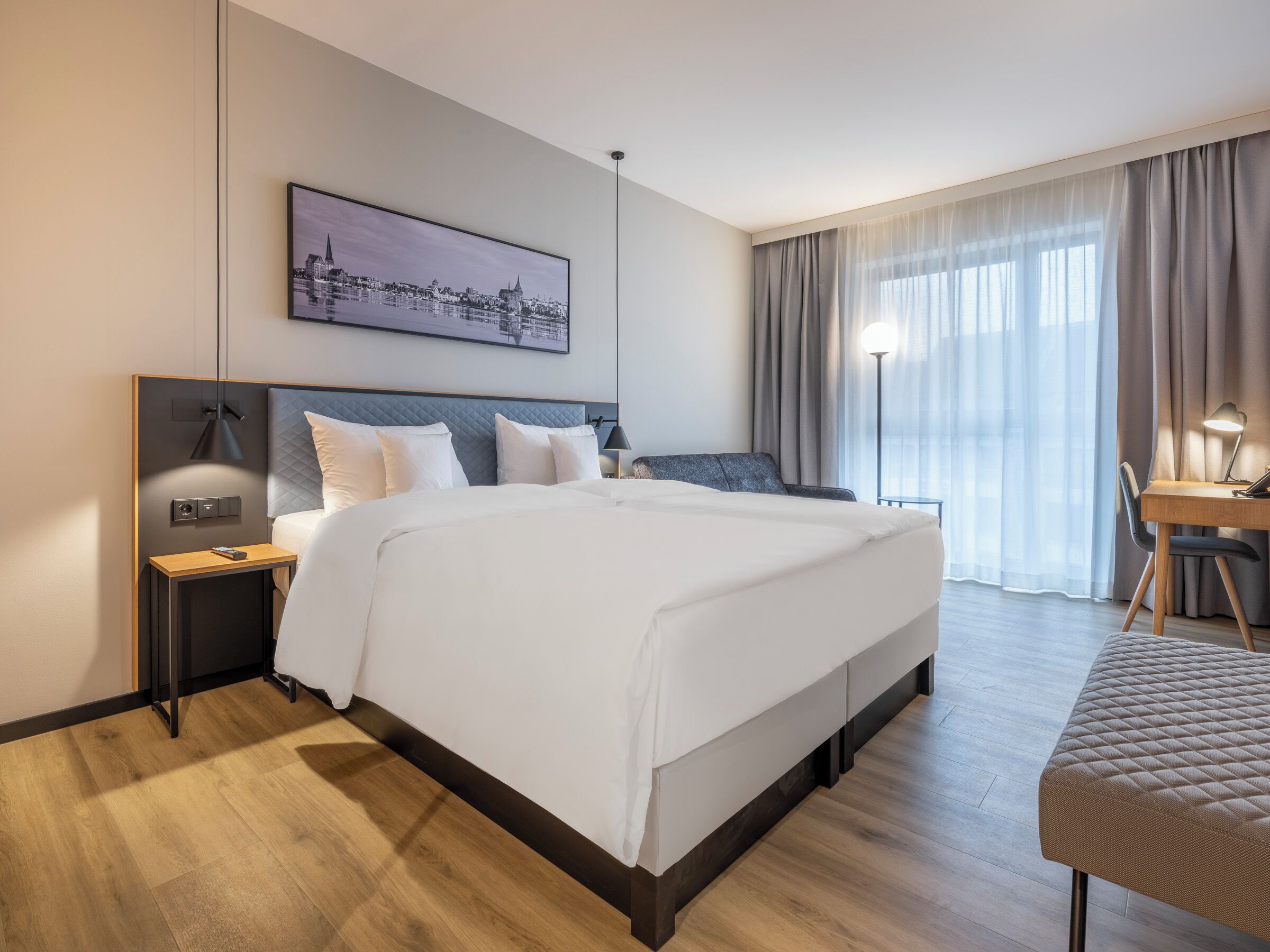 Hypo-allergenic bedding, down comforters, minibar, in-room safe