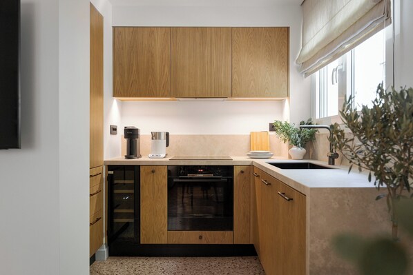 Superior Apartment, 2 Bedrooms | Private kitchen | Full-size fridge, microwave, oven, stovetop