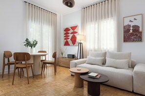 Superior Apartment, 2 Bedrooms | Living area | 55-inch Smart TV with cable channels, fireplace, Netflix