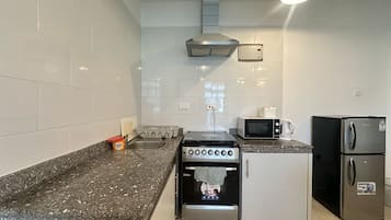 Microondas, horno y parrilla de estufa