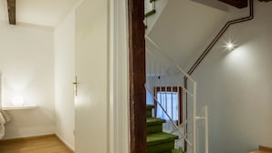 A staircase with green steps and white railings, leading to an upper floor. - Magic View - WiFi (Venezia)