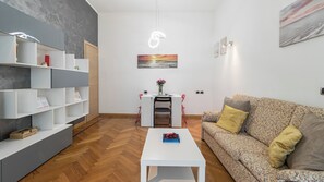 Apartment (1 Bedroom) | Living area | TV