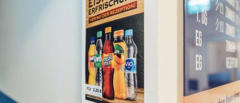 A poster advertising beverages with a price tag of 2.25 euros.