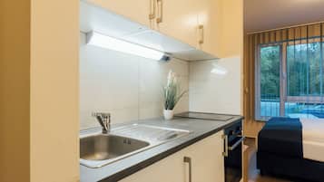 Mini-fridge, oven, stovetop