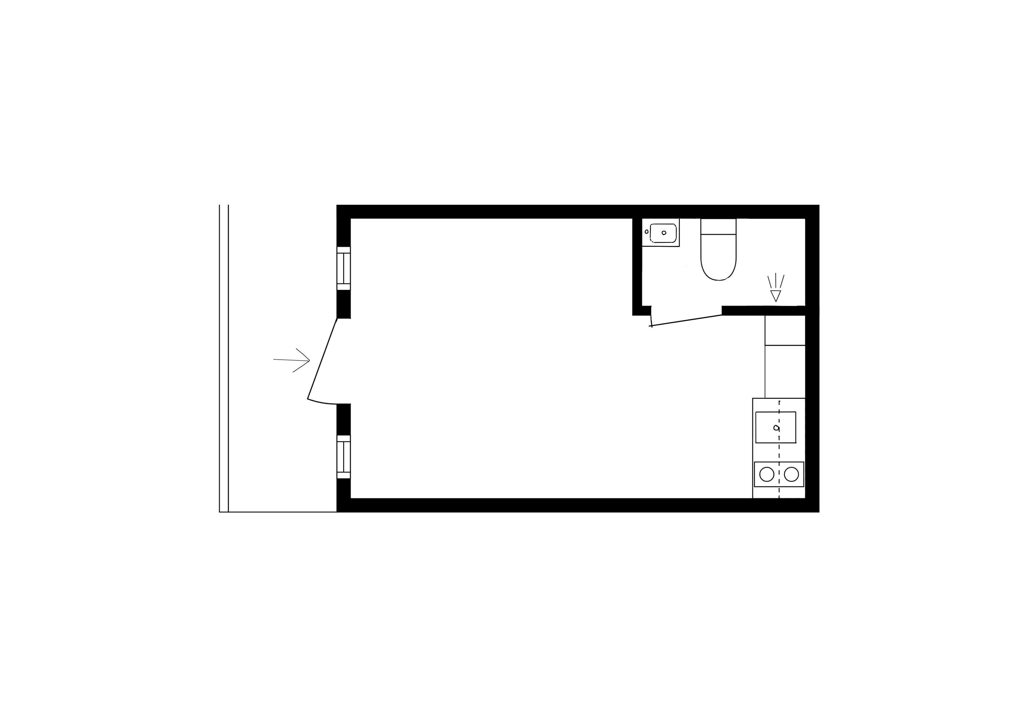 En planritning över ett hotellrum med badrum, pentry och en liten sittgrupp.