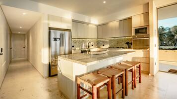 Deluxe Apartment, 3 Bedrooms, Pool Access, Ocean View | Private kitchen | Full-size fridge, microwave, oven, stovetop