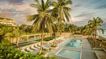 Outdoor pool, open 9:00 AM to 9:00 PM, sun loungers