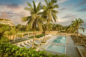 Outdoor pool, open 9:00 AM to 9:00 PM, pool loungers