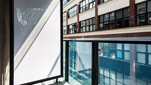 A modern building with large windows and a glass facade.