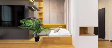 Tabla de planchar con plancha, cuna de viaje, wifi y ropa de cama