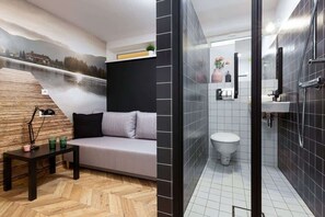 Shower, hair dryer, towels, shampoo