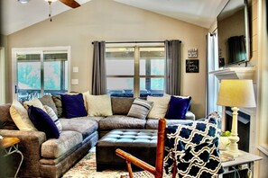 Smart TV, fireplace, books