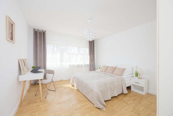 1 bedroom, desk, iron/ironing board, travel crib