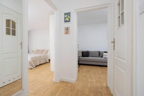 1 bedroom, desk, iron/ironing board, travel cot
