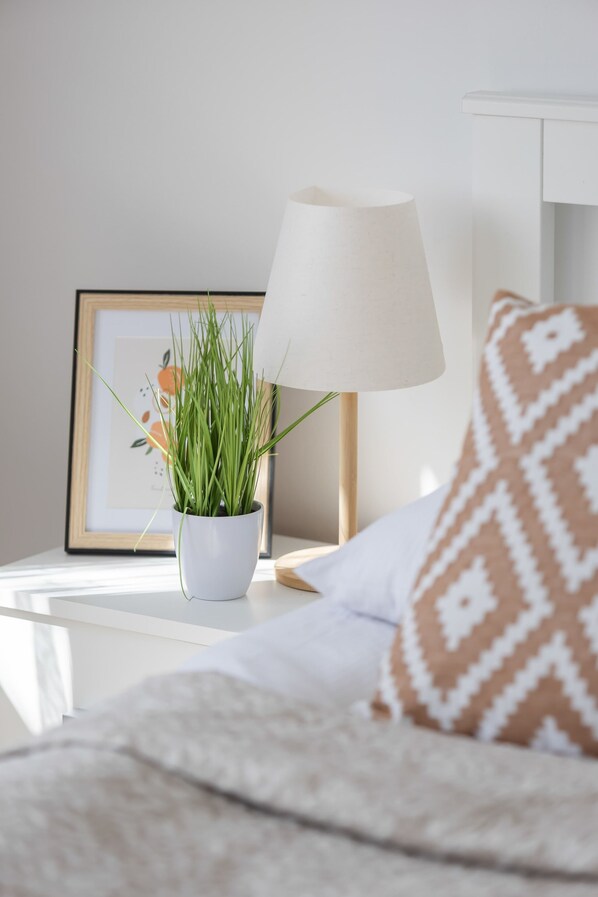 1 bedroom, desk, iron/ironing board, travel crib