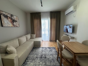 Apartment | Living area | Flat-screen TV