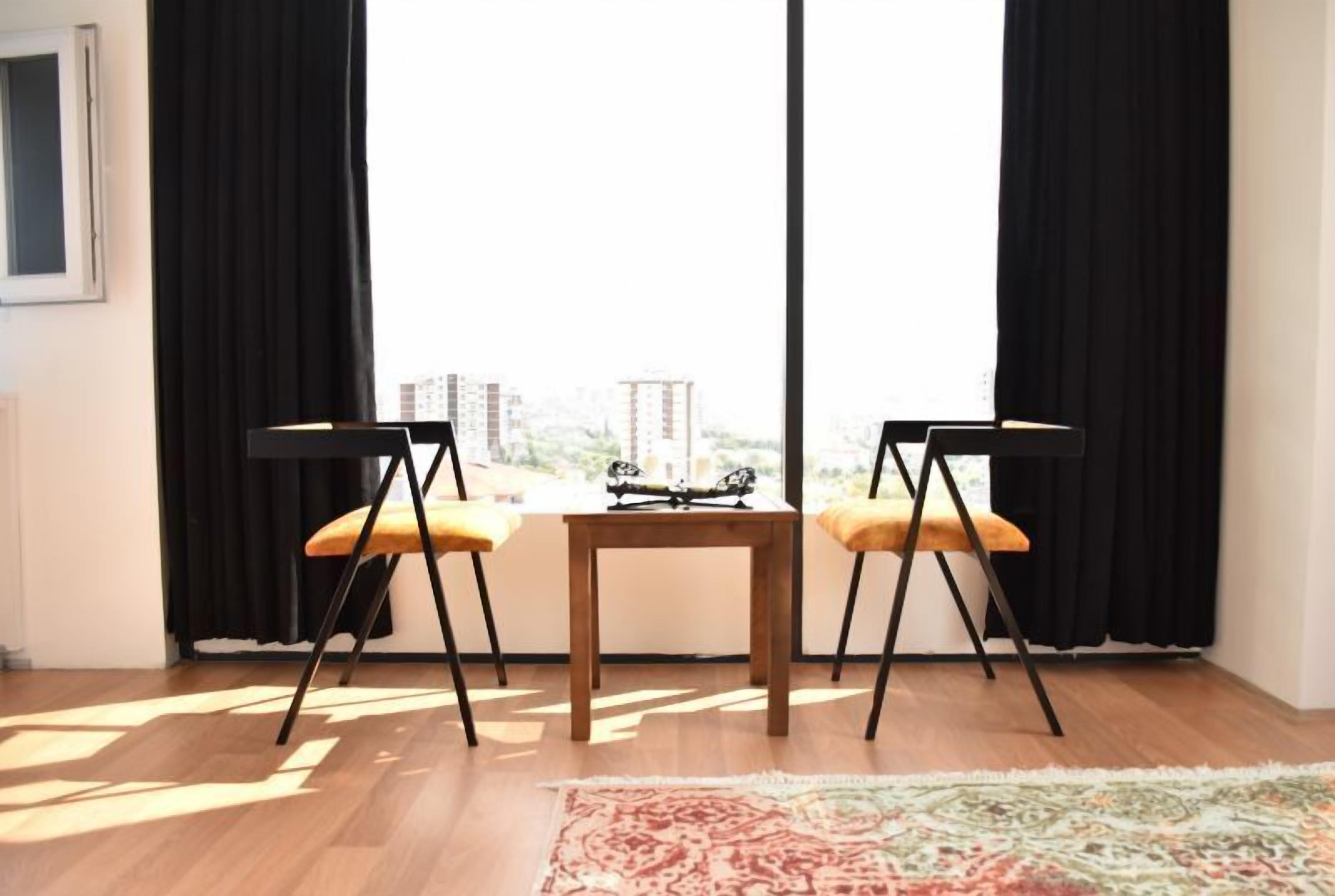 Deluxe Studio, City View | In-room dining