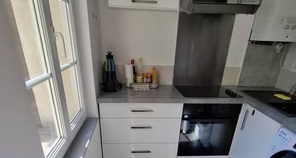 Appartement RDC avec cours.
Une maison de ville qui comprend deux appartements.