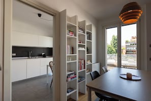 Deluxe Duplex, City View | Private kitchen | Full-sized fridge, microwave, oven, stovetop