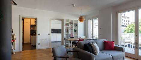 Deluxe Duplex, City View | Living area | 43-inch Smart TV with digital channels