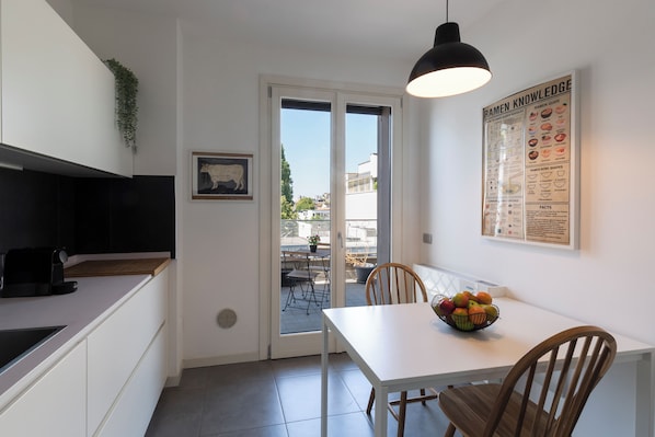 Deluxe Duplex, City View | Private kitchen | Full-sized fridge, microwave, oven, stovetop