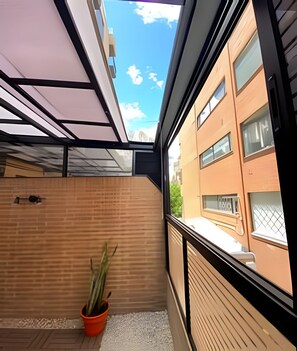 Apartamento Economico, Balcon | Overnatningsstedets område